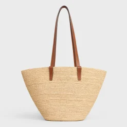 Fashion MEDIUM SUPPLE CLASSIC PANIER in Raffia and calfskin Women More Lines·Classic Panier | Categories·Hobo And Tote Bags