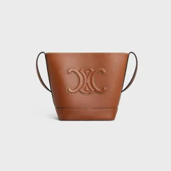 Best SMALL BUCKET CUIR TRIOMPHE in Smooth Calfskin Women More Lines·Cuir Triomphe | Categories·Cross-Body Bags