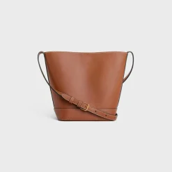 Best SMALL BUCKET CUIR TRIOMPHE in Smooth Calfskin Women More Lines·Cuir Triomphe | Categories·Cross-Body Bags