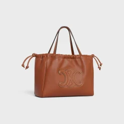 Online SMALL CABAS DRAWSTRING CUIR TRIOMPHE in Smooth Calfskin Women More Lines·Cuir Triomphe | Categories·Hobo And Tote Bags