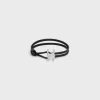 Discount Triomphe Clasp Bracelet in Calfskin and Brass with Rhodium Finish Bracelets & Rings